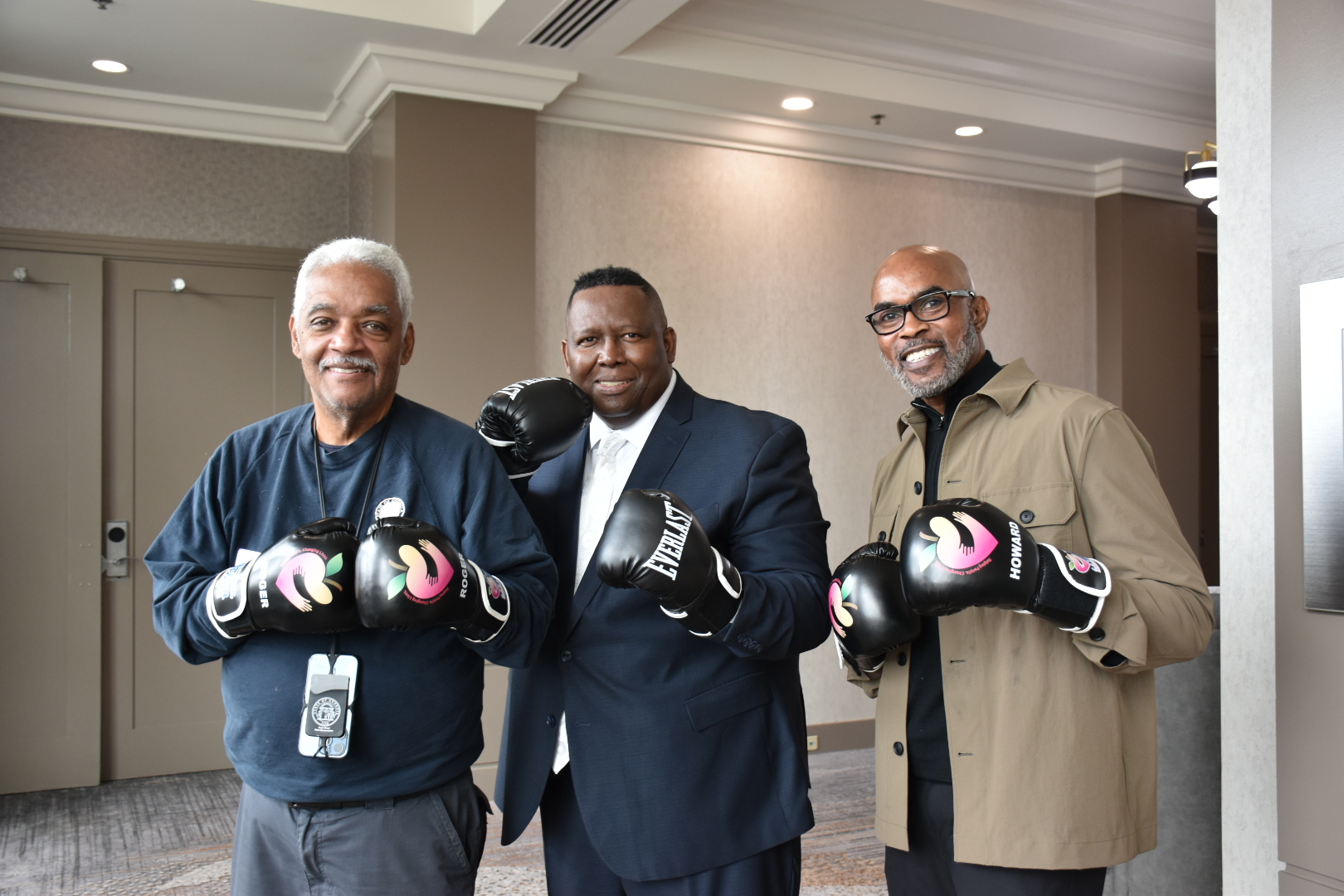 Dr. Grant with fellow leaders at a Community Action gathering